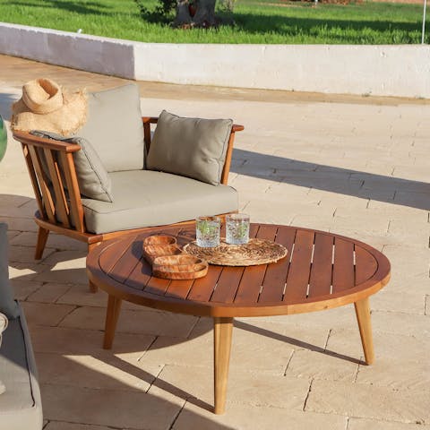 Enjoy a refreshing cocktail happy hour on the patio terrace – Aperol Spritz anyone?