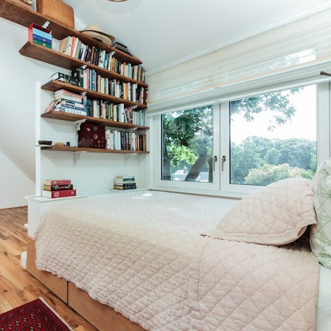 Fall asleep with a book selected from the home library in hand