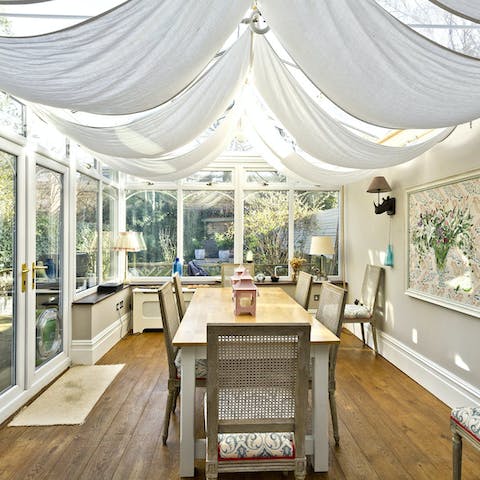Share your hard work under the conservatory's canopied ceiling