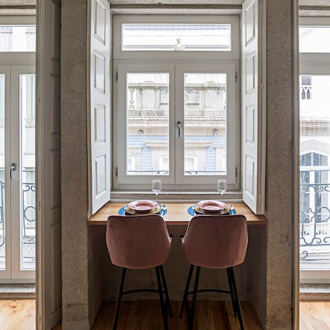 Enjoy a romantic supper for two in the elegant, window-side dining area