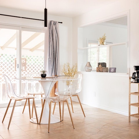 Gather for group meals in the bright and stylish kitchen-diner