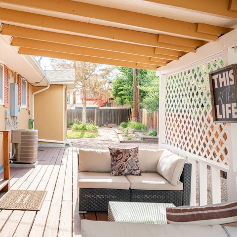 Enjoy a cup of Joe from your well-furnished deck overlooking the courtyard