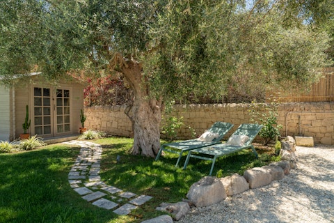 Find a shady spot in the garden to unwind with a good book