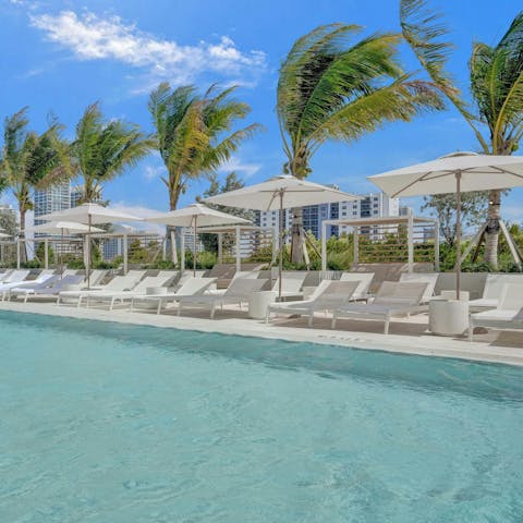 Lounge by the sprawling shared pool