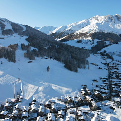 Stay in the Alpine town of Livigno, just steps away from the slopes