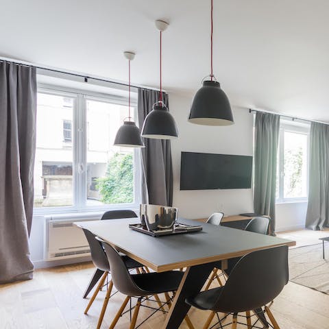 Sit down for breakfast in sophisticated Eames-style dining chairs