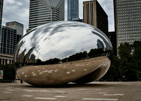 Marvel at the iconic Cloud Gate in Millennium Park, a six-minute walk