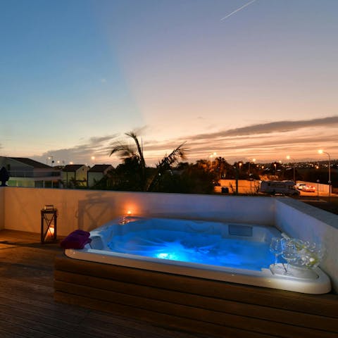 Soak in the rooftop hot tub and admire the view