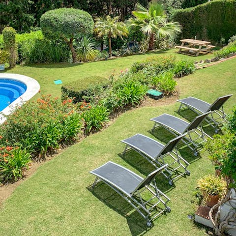Relax in the lush gardens