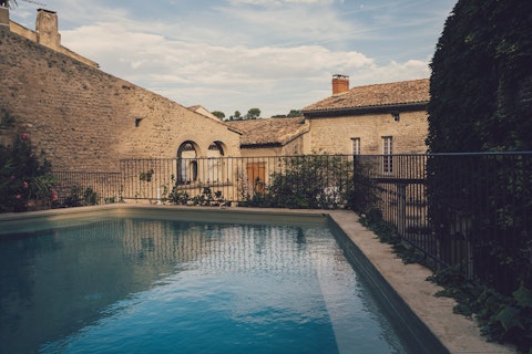 Cool off in the pool ringed by ancient stone walls