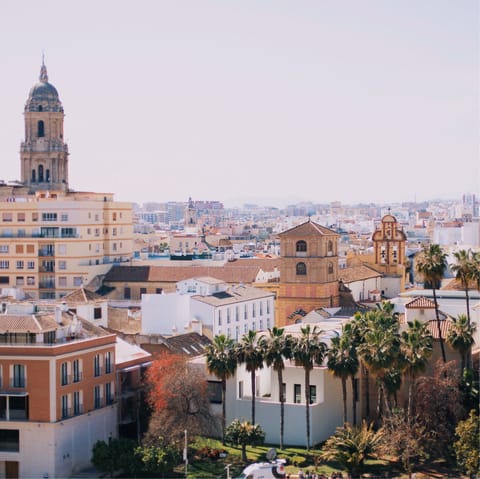 Wander the streets of the charming coastal city of Malaga