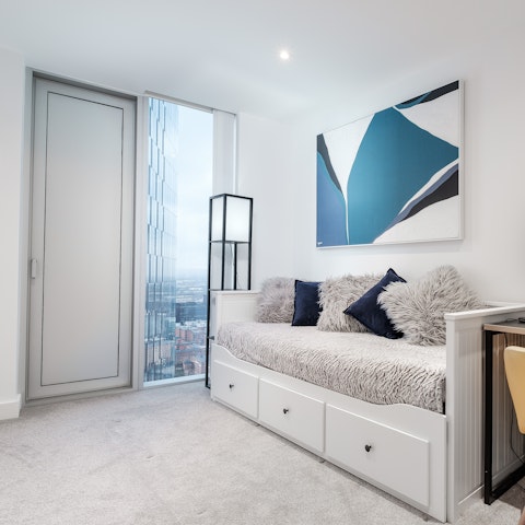 Soak up the cityscapes from this 39th floor home