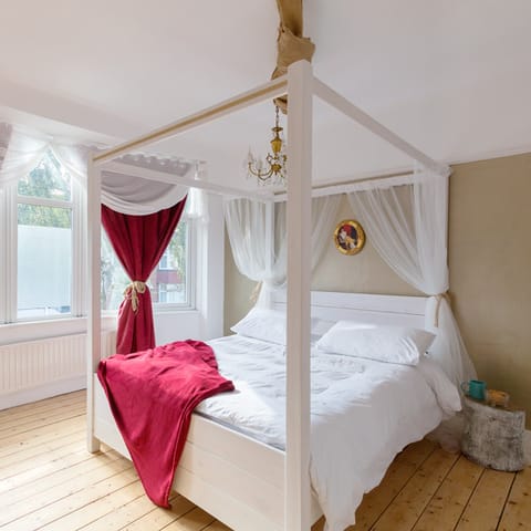 The luxurious four posted bedroom