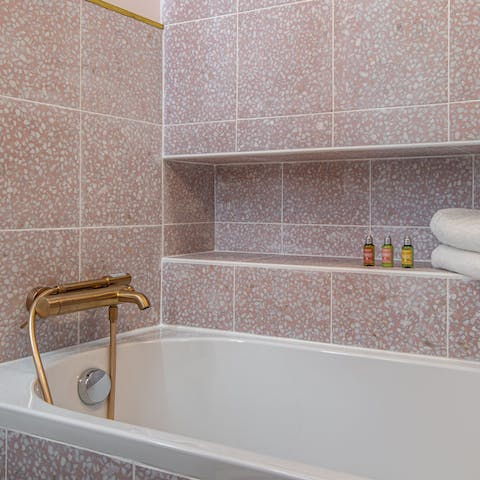 Unwind in the bathtub, after a day of exploring the cobbled streets of Paris