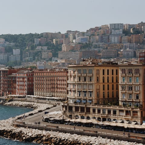 Head to Naple's seafront restaurants for Neapolitan classic cuisine, just a twenty-minute stroll away