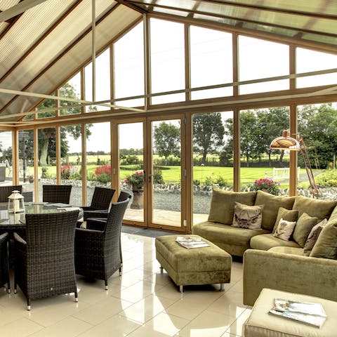Admire the gardens through the huge windows