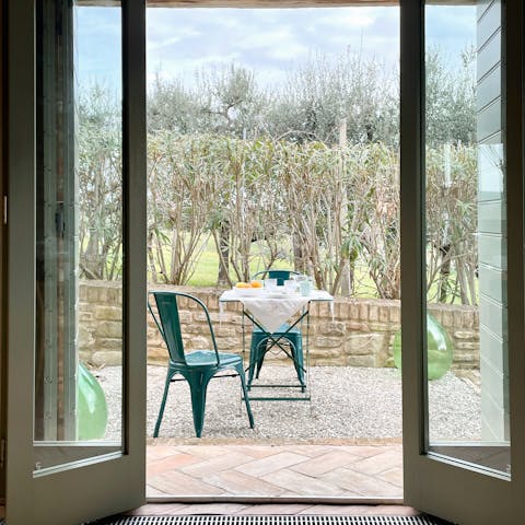 Breathe in the fresh air on the front porch with a glass of local wine