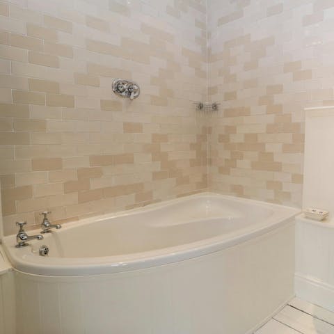 Soothe tired muscles in the tub after a day in the great outdoors