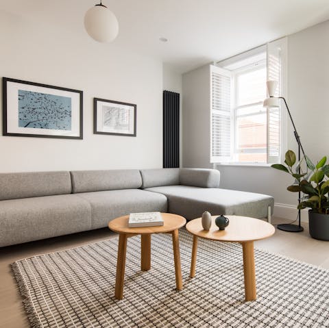 Sprawl out on the cosy L-shaped sofa for a movie night – the TV has Netflix and Amazon Prime
