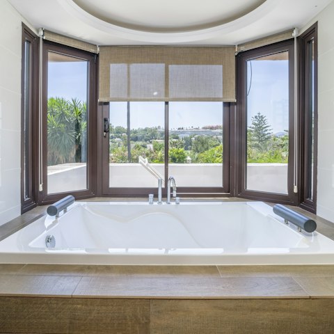 Relax and unwind with a luxurious bath in one of the sleek bathrooms