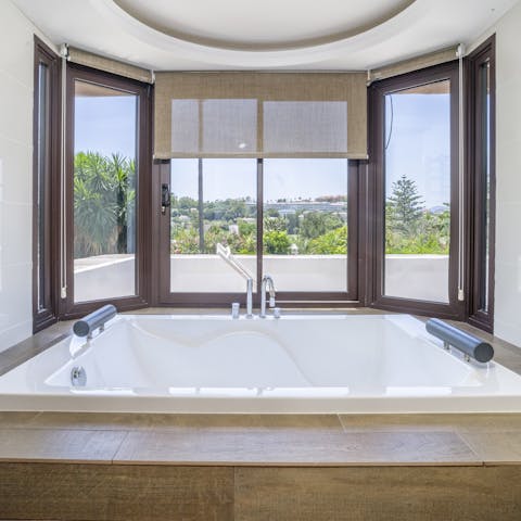 Relax and unwind with a luxurious bath in one of the sleek bathrooms