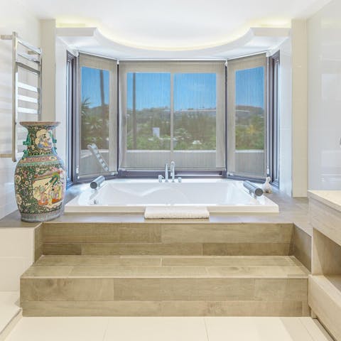 Relax and unwind with a luxurious bath in one of the sleek bathrooms