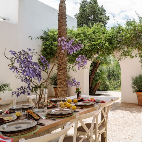 Look forward to leisurely meals beneath the Mediterranean sun