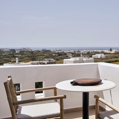 Start the day with a cup of coffee on the balcony