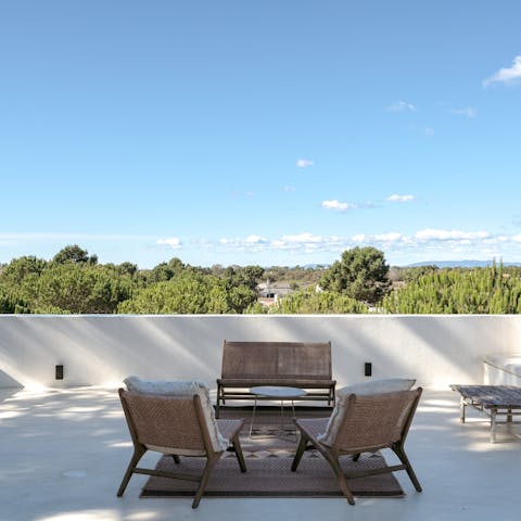 Round off each day with a cocktail on the roof terrace