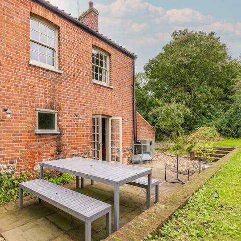 Dine alfresco on the garden patio