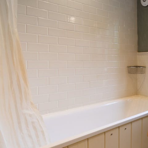 Unwind in the bathtub after a day out in the fresh country air