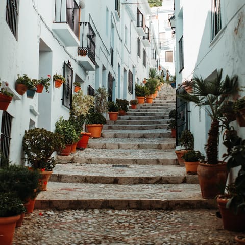 Drive through the countryside to Frigiliana, known for its Moorish architecture
