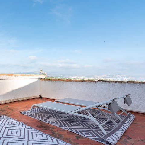 Head up to the rooftop terrace for a spot of sun bathing