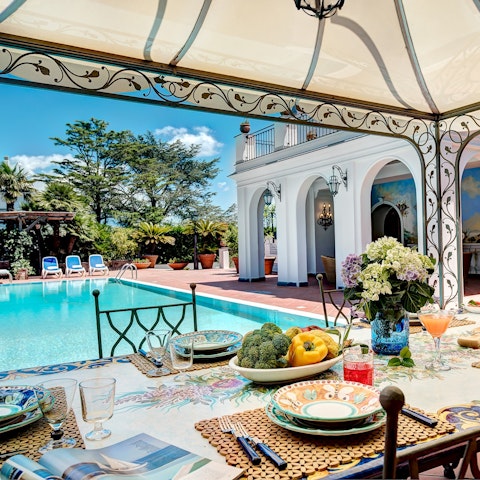 Enjoy leisurely lunches overlooking the pool