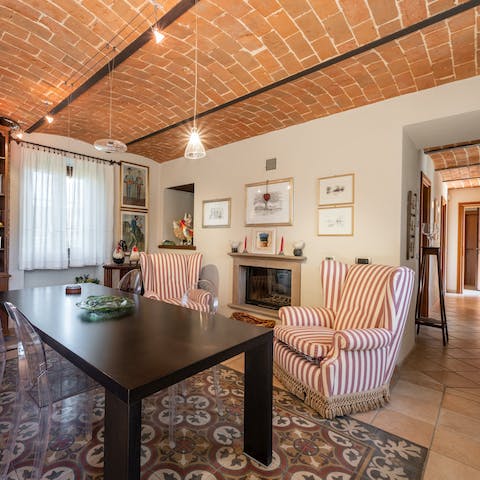 Light up the open-hearth fireplace and get cosy around the flames