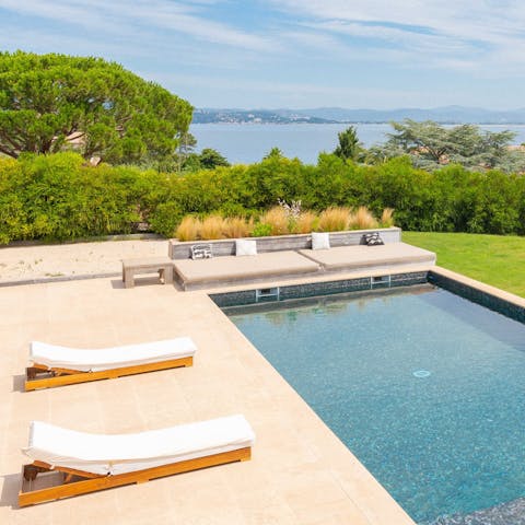 Bask in the sunshine, lounged by the private pool