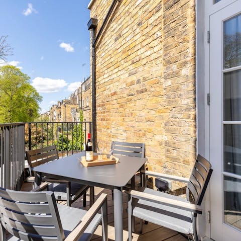 Enjoy a morning coffee or evening aperitif on the private balcony