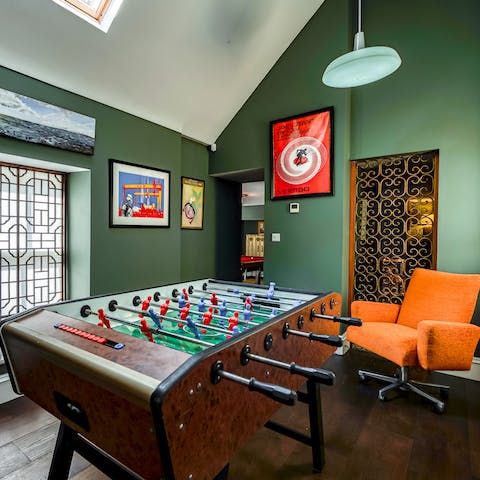 Get competitive playing table football and pool