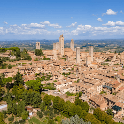 Spend the day in the nearby medieval village of San Gimignano