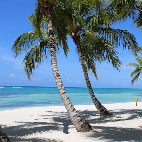Take your pick from two beach clubs for a day on the sand