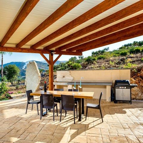 Dine alfresco overlooking the mountain vistas
