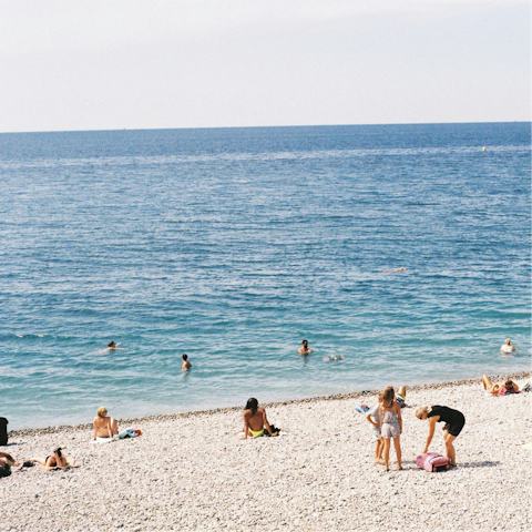 Stroll along Spiagga di Guidaloca, a ten-minute drive away