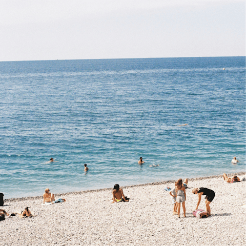Stroll along Spiagga di Guidaloca, a ten-minute drive away