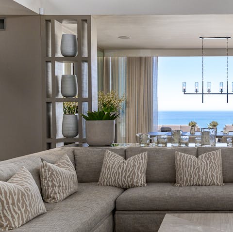 Get cosy in the plush and elegant living room