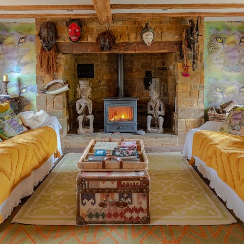 Cosy up in front of the fire with a book selected from the home library