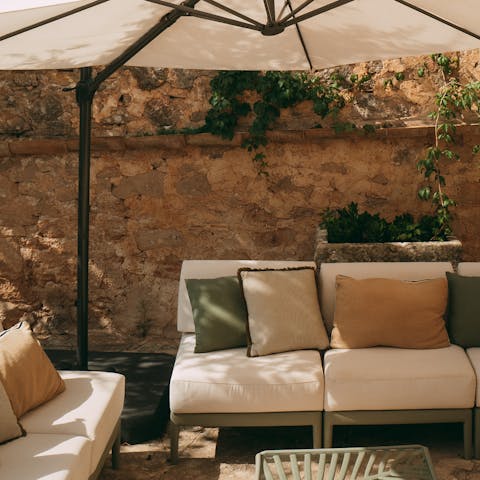 Unwind with a Palo de Mallorca and watch the sunset