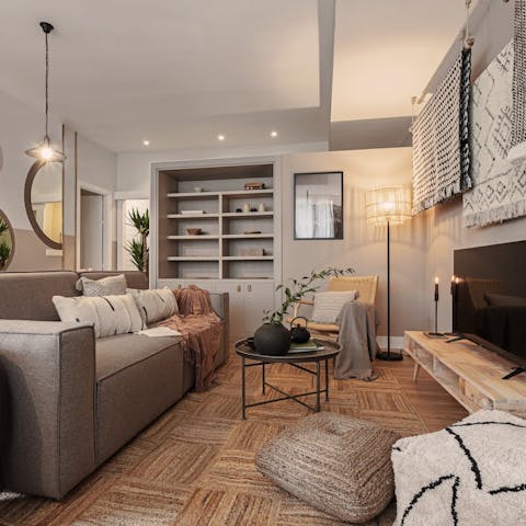 Unwind with your loved ones with a movie night on the plump linen sofa