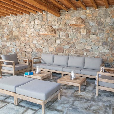 Sip a refreshing limonata with your holiday read under the pergola