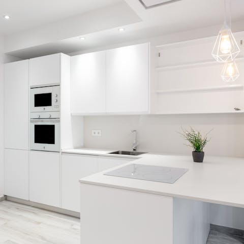 Whip up Spanish omelettes in the sleek and modern kitchen