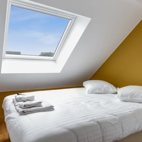 Wake up with blue skies sweeping over you